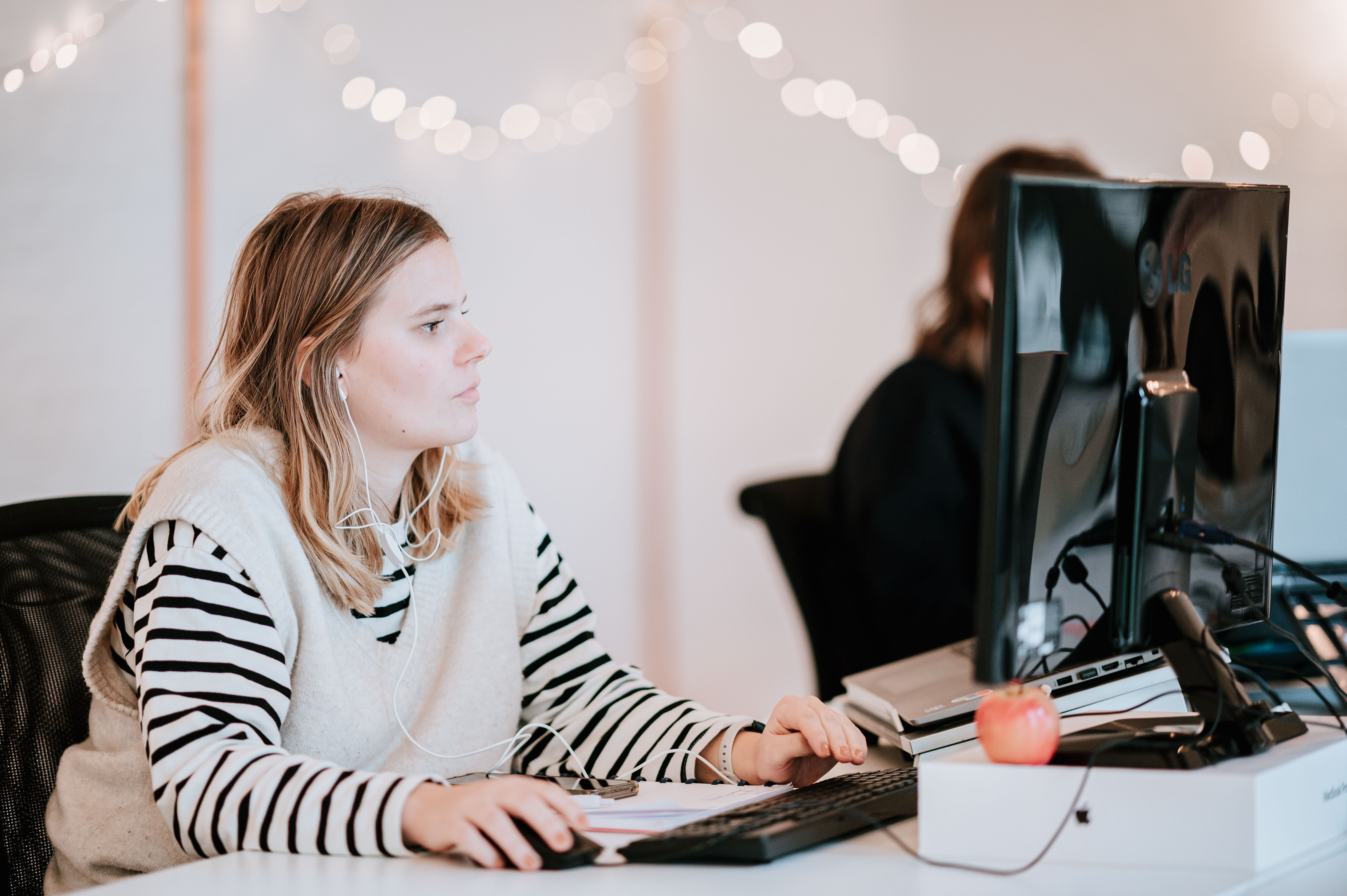 Focused person sitting at a desk